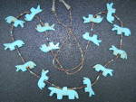 Native American Carved Turquoise Horses Fetish Necklace with Heishi Sterling Silver Points and Hook Clasp. 31 inches 1 1/4 inches each and 1 3/4 inch center 