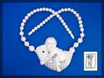 Beautiful Ivory pre ban 60s necklace Graduated beads and large Central piece  Baby Riding a   Fish. 18 inches end to end the Central pendant is 3 inches Wide and 2 1/2 inches down. The pendant is Sign...