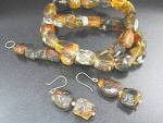 Chunky Rough Cut Amber 19 inch Necklace and 2 inch Earrings with Sterling Silver from Chiapas Mexico. The Amber has wonderful different Colors in it.