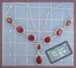 Sterling Silver and Genuine Ruby necklace. the necklace is 17 inches and there is a 2 inch pendant attached. the rubies are large and Genuine though cloudy. They are bezel Set in Sterling Silver and a...