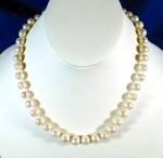18 Inch Freshwater Pearl Necklace. The Pearls are 9mm and there is a Sterling Silver Lobster Clasp on them.