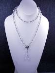 Sterling Silver and Crystal Beads Retired Silpada Necklace 34 inches long with a Sterling Silver toggle and 2 inch dangle of crystal beads.