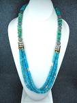 Tommy Singer Sterling Silver 3 Strand Sleeping Beauty Turquoise Necklace. The Single Strand is Kingman Turquoise and the 3 lower strands are Sleeping Beauty with Sterling Silver Signature Beads and St...