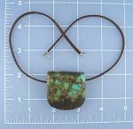 Chocolate Suede leather 16 inch necklace with a large 1 1/2 inch chinese Turquoise pedndant. The Turquoise is Blue Green and tan.