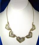 Jeep Collins of Texas 5 hearts Sterling Silver Necklace 18 inches with hook clasp. Each heart is 1 3/8 inches.