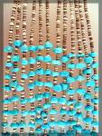 Turquoise and Heishi Bead 6 Strand Necklace from Santo Domingo. The necklace is 32 Inches and there is no clasp. it has cord which can be shortened.