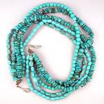 EX EX 5 Strands of Kingman Turquoise necklace 17 1/2 inches the Beads are different shapes...2 are smooth nugget one is round thed other two are elongated smooth. hook clasp with EXEX makers logo on a...