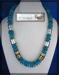 Navajo Tommy Singer Turquoise and Sterling Silver Barrel beads with 2 Very Large Signature Sterling Silver and Gold beads Spaced along beautiful Sky Blue Turquoise Beads 22 Inches  Signature Tag at th...