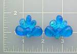 Vintage Pair of Clip earrings made in Japan that measure 1 inch by 1 1/4 inches in blue faceted plastic/Lucite. They are in good vintage condition.  <BR>