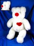 Soft and lovable white teddy bear with a red nose and heart. Stands 14 inches tall and lives in a smoke free home.