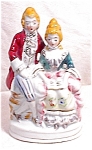 Pretty 5 1/4" tall figurine of a gentlemen reading sonnets to his lady.  Nicely decorated, perfect condition. Makes nice romantic gift or add to your collection of Occupied/Made in Japan figurine...