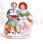Sweet little 2 1/2" figurines of colonial couples...we have two!!!<BR>Perfect for double dating. Both pieces in perfect condition.  Buy single for $18 each or we will give you both for<BR>$33.00.