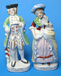 This man and woman in colonial dress are each about 4 3/8" tall.  Classic.  No damage or problems of any kind.  Marked JAPAN.  <BR><BR>Keywords - gifts gift figurines collectible collectable coll...