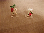 A pair of the cutest miniature ornaments I have ever seen.  It is "Little Bear" and "Little Husky".  Both are only 1" tall and still in original boxes and wrapper.  In excelle...