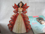 Wonderful Barbie ornament from 1997.  Dress is made of ribbons.  Has only been out o the box to be photographed.  Has the Hallmark marking on the bottom of the Barbie. Box and ornament are both in exc...