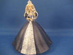 From Hallmarks limited edicition ornament.  This wonderful Barbie ornament is holding a ball for the millemmium new year.  Still in original box.  In excellent condition.