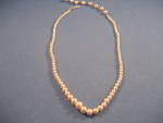 Wonderful pearl choker made in Japan.  Necklace is 12" long and in excellent condition.