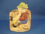 Wonderful little planter of a boy blowing a bugle.  Planter is 4" tall and does have a tiny crack of the left front corner, but otherwise in excellent condition.  (see picture).  Has "Made i...