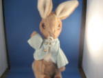 Wonderful Peter Rabbit stuffed toy from Eden.  Has the cutest jacket on.  There is one stain on one arm of the jacket (see picture), but otherwise in excellent condition. Still has the Eden tag on.