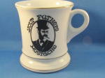 That is what the front of this great mustache cups says.  Has a "Made in Japan" sticker on the bottom.  In excellent condition.