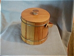 Was not sure if this needed to be in the category of advertisement or woodenware.  Wonderful wooden bucket in the design of the old sugar buckets.  Bucket is 7 1/2" tall and 6" in diameter. ...