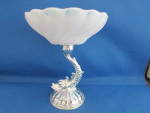 Wonderful milk glass compote with a fish stem.  Compote is 5 3/4" tall and in excellent condition.