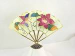 This is a brooch in the shape of a fan.  It is not signed.  The brooch has cloisonne or enameling on it.  There is an applied butterfly and an applied flower.  The brooch measures 2-3/4 inches by 2 in...