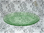 This green Floral Oval Platter was produced by Jeannette Glass from 1931  35. More commonly known as Poinsettia the platter measures 10 " in length and 8" wide and is in excellent conditio...