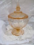 This Pink Princess Covered Candy Dish will be the perfect addition to any collection. Made by Hocking Glass Company between 1931-1934 it measures approximately 4 " in diameter and 8" tall w...