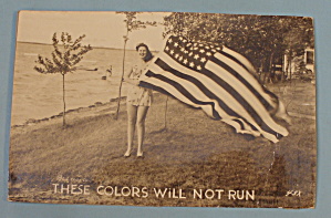 Woman Holding The American Flag Postcard
