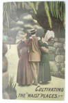 A Man With A Woman On Each Arm Postcard