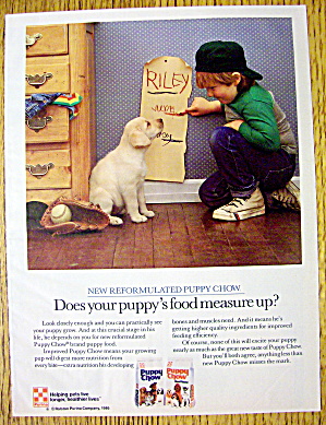1986 Puppy Chow With Boy Measuring Puppy