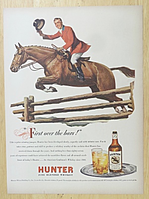1947 Hunter Whiskey With Man Riding On A Horse