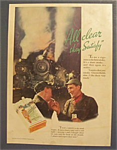 1934 Chesterfield Cigarettes W/two Men By The Railroad