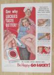 1952 Lucky Strike Cigarettes w/Man & Woman Barbecuing