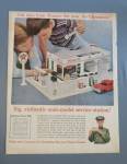 1960 Texaco with Children Play With Model Gas Station