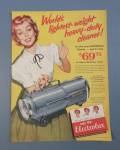 1955 Elecrolux Cleaner with Woman Holding Cleaner