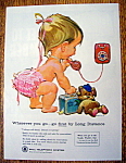 1962 Bell Telephone System with Baby on Telephone  