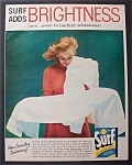 1957 Surf Whitener with Woman Admiring a White Towel