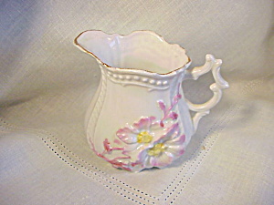 Unmarked Ornate Handled Pitcher