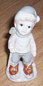 Adorable Little Boy Skier Figurine