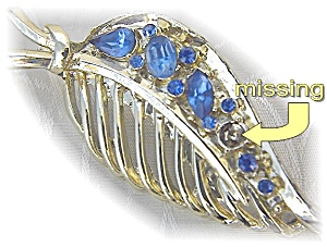 Silvertone Pin With Blue Stones