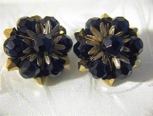 Vintage Black And Golden Glass Clip Earrings.