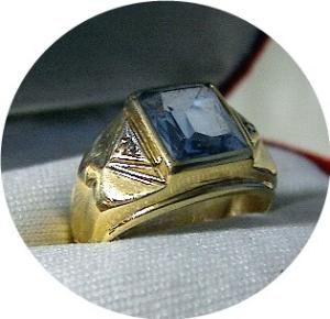 10k Gold Diamond And 2 1/2 Ct Blue Stone Ring . . . .