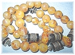 Vintage Amber Colored Beads Black Spacers