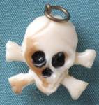 Vintage Celluloid Skull with Crossbones Charm