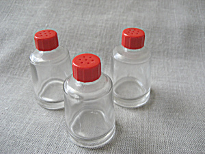 Three Red Cap Salt And Pepper Shakers