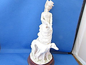 Arnart Pucci Designed Victorian Woman Walking Dog Figuriine
