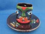 Face Cup and Saucer