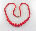VINTAGE ART DECO CARVED OR MOLDED RED CELLULOID BEAD NECKLACE